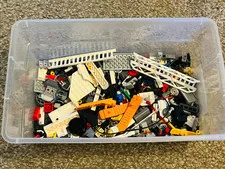Miscellaneous Lego Pieces - Contains Three Orange Brick Separators