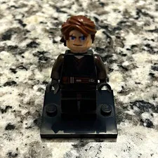 LEGO Minifigure w/ Brown Hair & Dark Outfit & Black Display Base