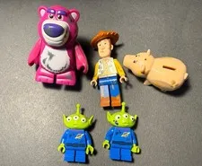 LEGO Minifigure Lot From Set 7596 Toy Story Woody Lotso Hamm Claw Aliens