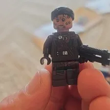 LEGO minifigure dark brown outfit character w/ black blaster gun accessory