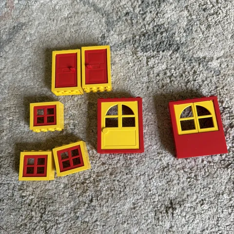 Lot of vintage LEGO windows and doors, yellow and red