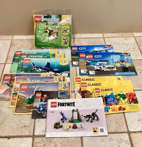 LEGO 13 Piece Lot of Misc. Instruction Manuals & 1 Sealed Creator Poly #30666