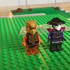 LEGO Plastic Minifigure Lot of 2 Trans Orange Figure & Purple/Black w/ Hat