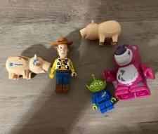 LEGO Minifigure Lot From Set 7596 Toy Story Woody Lotso Hamm Claw Alien