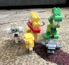 LEGO Bulk Lot Animal Builds Dog Duck Dinosaur Shark Multicolor Plastic Parts