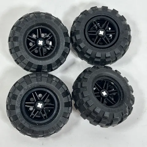 (4) LEGO 56x26 Balloon Tire Wheel Lot -Black rims #56145- Technic (a7)
