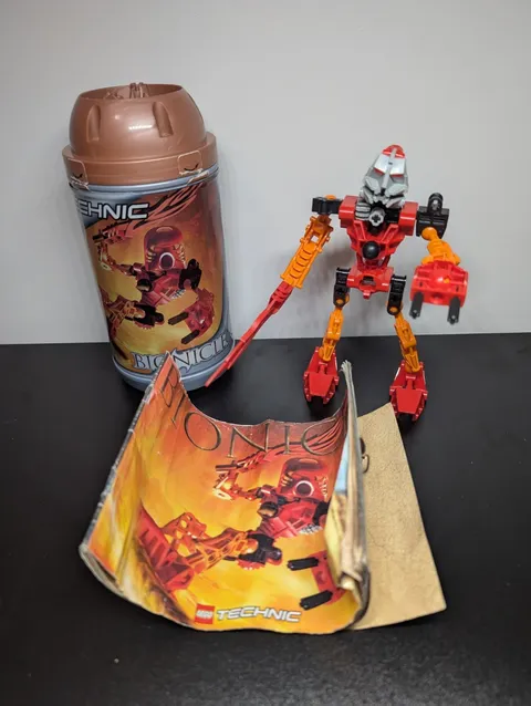 LEGO Bionicle 8534 Toa Tahu Figure With Manual And Canister Rare Missing Mask