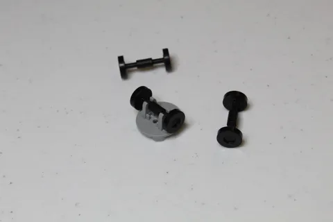 (1) LEGO Plate Round 2x2 + Tiny Black Wheels x3 (2655 + 2496) - Light Gray