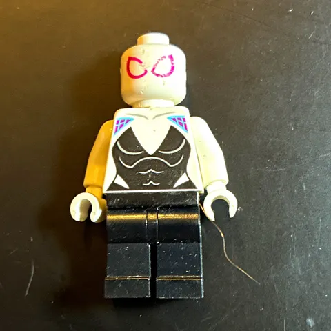 LEGO Minifigure White Head Pink Goggles Face, White Torso/Black Print, Legs