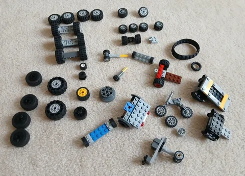 LEGO Bulk lot of Wheels Tires / axles Variety of Sizes