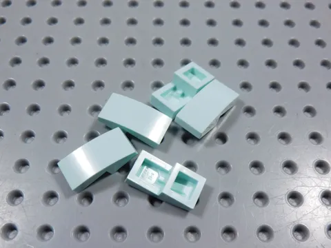LEGO Lot of 5 Aqua Blue 2x1 Curved Slopes No Stud BE