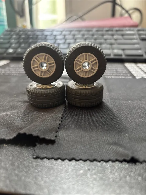Lego Lot of 4 Wheel/Tire 55981 Lt Bl Gray Wheel 30.4x14 Solid w/Pin Hole 58090