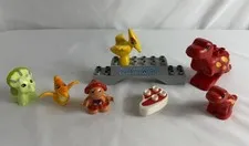 Lego Duplo - Lot Of  Vintage Dinosaur Figure Pieces With Jurassic World Sign