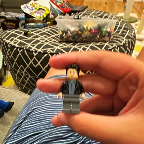LEGO Minifigure Black Hair Black Jacket Gray Legs - 1 Piece Plastic, Age 4+