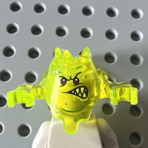 LEGO 19861pb01 Ninjago Skreemer Mask Dark Purple Eyes Lopsided Teeth Trans-Neon