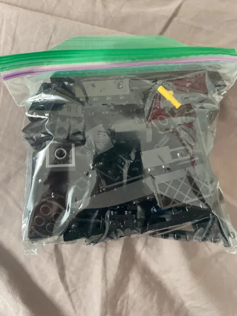 4- 1/2 pound bags of black lego pieces - used pieces - random pieces