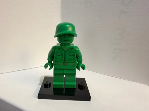 LEGO Green Army Man - From Toy Story sets - Incomplete - Bite  marks on head