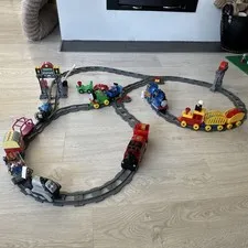 LEGO DUPLO Vintage and Discontinued Thomas set PLUS a motorized locomotive.