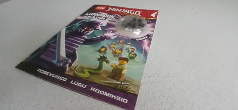 old LEGO ninjago book with peice sets