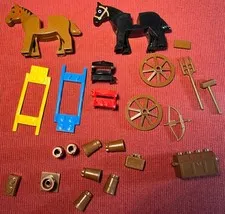 Lego lot of 23 horse related items: 2 horses, saddles, harnesses, wheels, chest