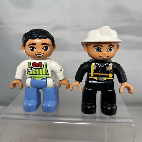 Lego Duplo Young Fireman and Grocery Clerk Figures - Lot of 2