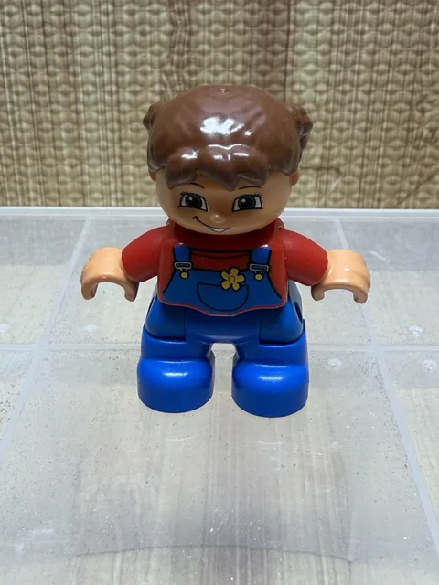 Lego Duplo Figure Kid Girl brown hair red/blue overalls flower 