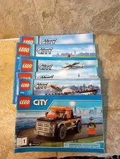 lot of 11 Legos city instruction guides Books