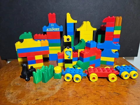 LEGO - DUPLO - LOT of 100+ PIECES & 3 vehicles, 1 animal, and 1 little person.