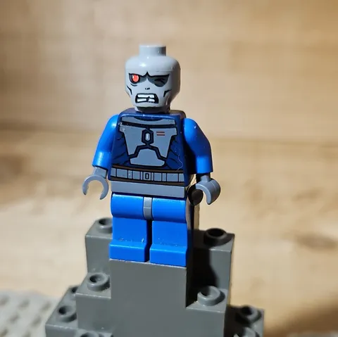 LEGO Plastic Superhero Minifigure Blue Suit Gray Head w/ Red Eyes