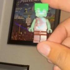 LEGO Minecraft Zombie Minifigure Green Head, Light Blue Torso, Brown Legs 1pc