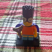 LEGO Bart Simpson Minifigure w/ Purple Cape, Slingshot & Black Display Base