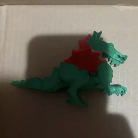 Authentic vintage LEGO green dragon with red wings. A classic from the LEGO