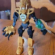 LEGO BIONICLE Figure Gold Black with Green Translucent Piece Plastic Loose