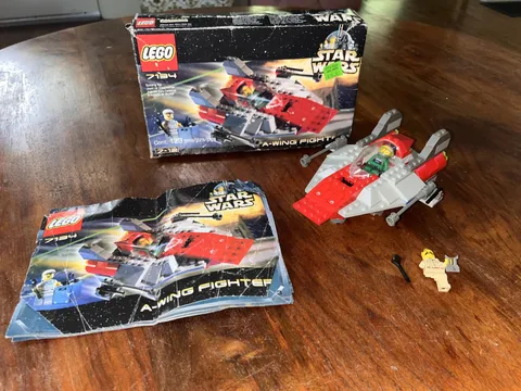 LEGO Star Wars: A-Wing Fighter (7134) Complete, damaged minifig. w/ Instructions