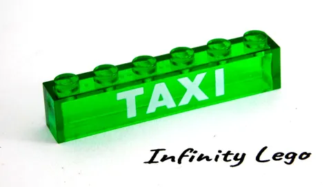 LEGO Vintage Transparent Green Brick 1 x 6 with "TAXI" without Bottom Tubes 3076